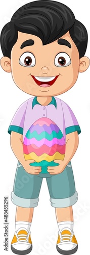 Cartoon little boy holding an easter egg