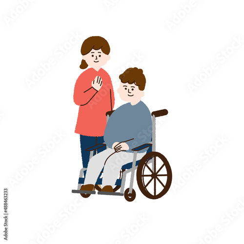 車椅子に座る夫と妻