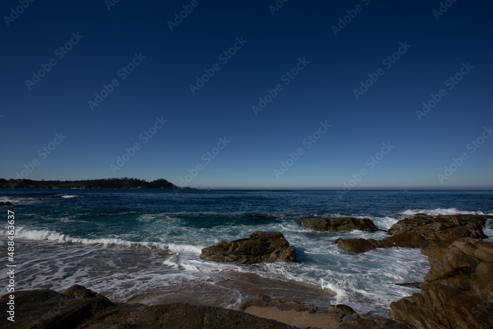 A view on the Pacific ocean with sky and waves