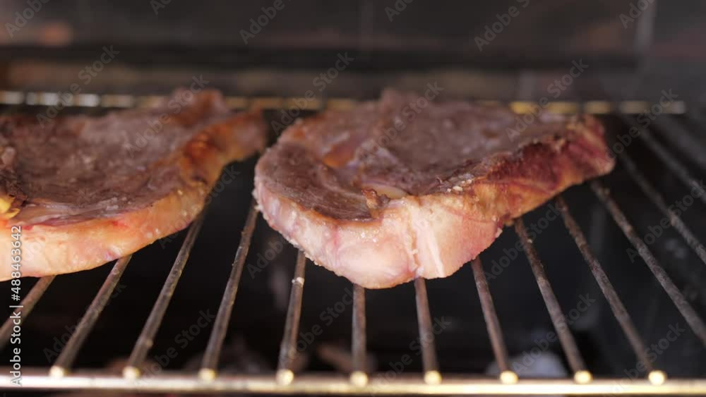 steak beef on grill slow motion 4k steak beef on grill slow motion 4k