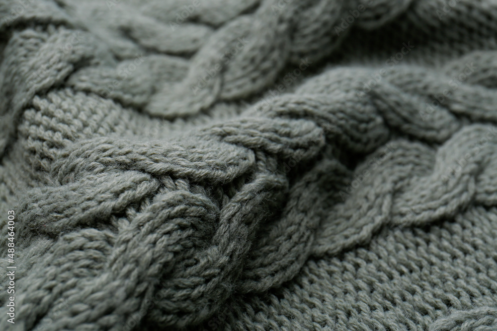Knitted fabric with beautiful pattern as background, closeup Knitted fabric with beautiful pattern as background, closeup