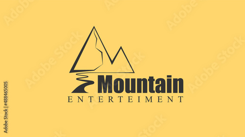 Logo of some company with mountain and river.
