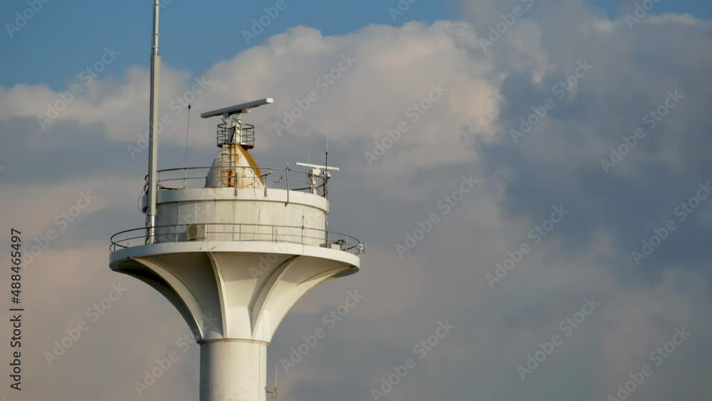Electromagnetic beacon in navigation on blue sky with clouds background. Strait Bosphorus in Istanbul in Turkey. Determine direction to seacost Electromagnetic beacon in navigation on blue sky with clouds background. Strait Bosphorus in Istanbul in Turkey. Determine direction to seacost