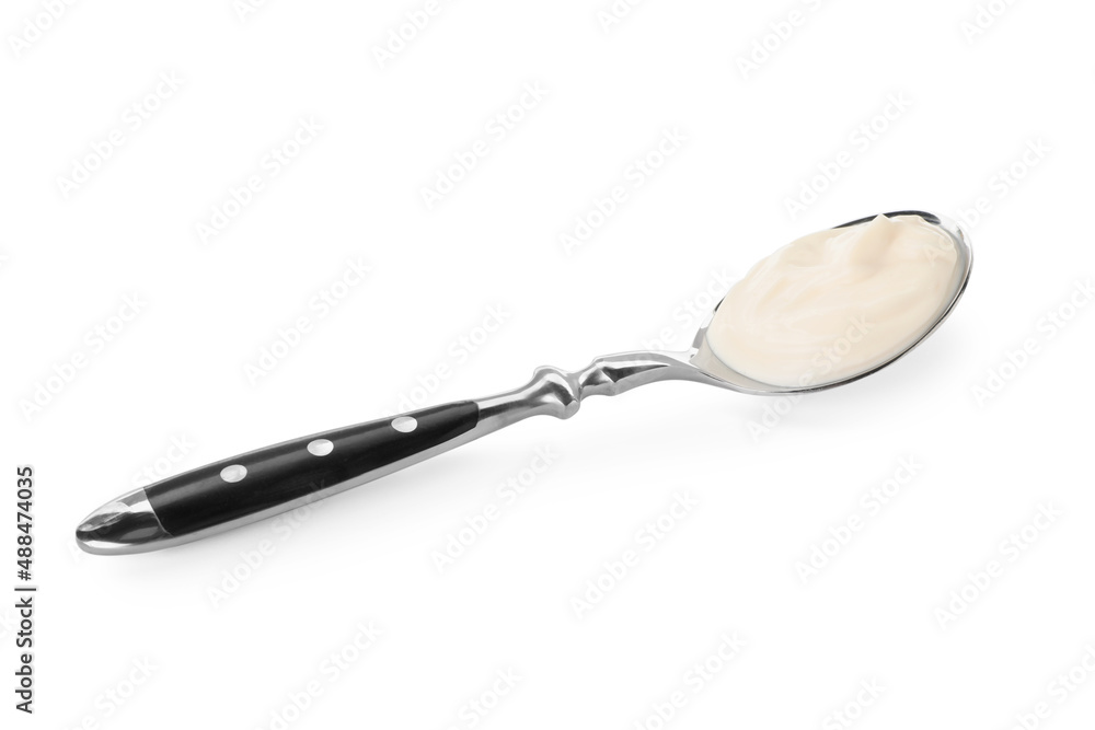 Spoon with tasty mayonnaise isolated on white Spoon with tasty mayonnaise isolated on white