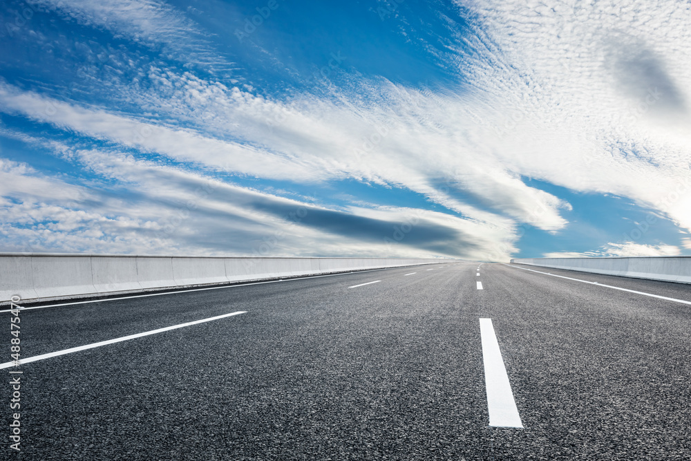Empty asphalt road and beautiful sky clouds background Empty asphalt road and beautiful sky clouds background