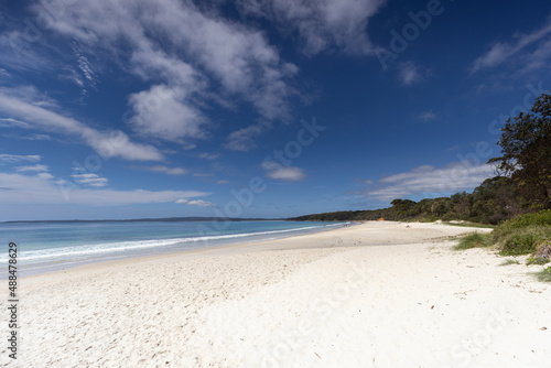 Fototapeta Naklejka Na Ścianę i Meble -  View along the white sand of Nelsons beach near Jervis Bay in NSW, Australia