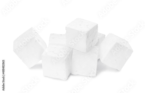 Many small styrofoam cubes on white background