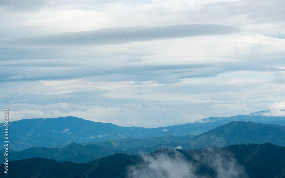 Surreal landscape of morning foggy..Morning clouds at sunrise.Landscape of fog and mountains of northern Thailand. Surreal landscape of morning foggy..Morning clouds at sunrise.Landscape of fog and mountains of northern Thailand.