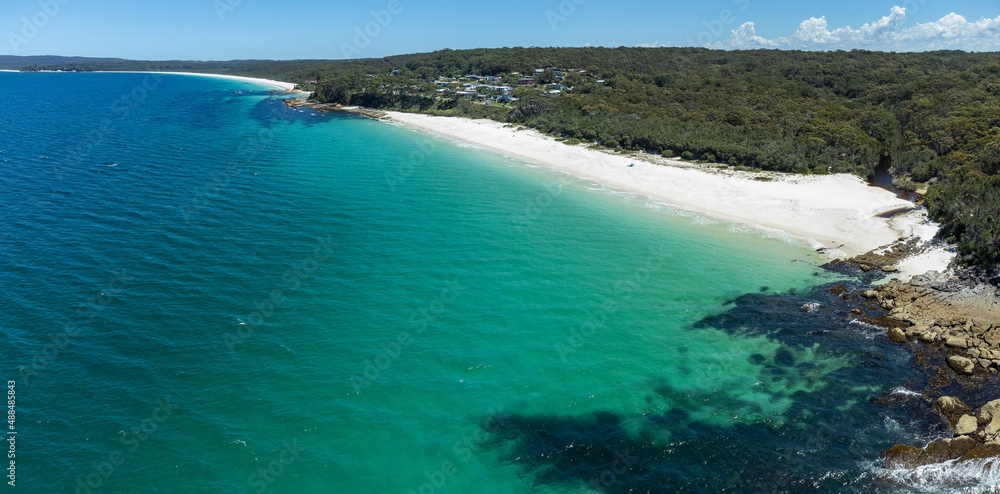 Aerial view of  the beautiful Chinamans (in distance) and Greenfield beach in NSW, Australia, a popular white sand swimming beach