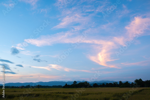 Colorful sunset and sunrise with clouds. Blue and orange color of nature. Many white clouds in the blue sky. The weather is clear today. sunset in the clouds. The sky is twilight.