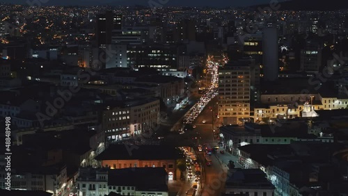 Trafico de la ciudad en el Centro norte  en la ciudad de Quito por la noche. photo