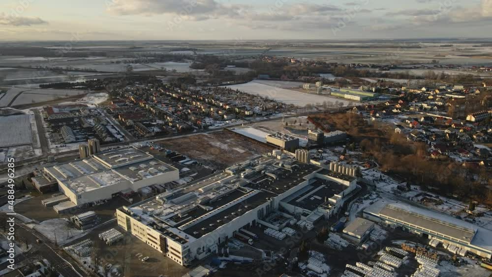 Modern industrial area with factory near residential district in european city, aerial view Modern industrial area with factory near residential district in european city, aerial view