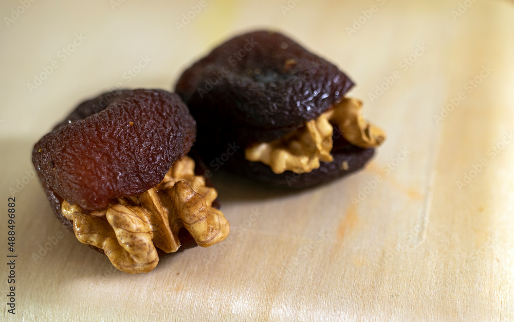 dried apricots with walnuts. close up dried apricots with walnuts. close up
