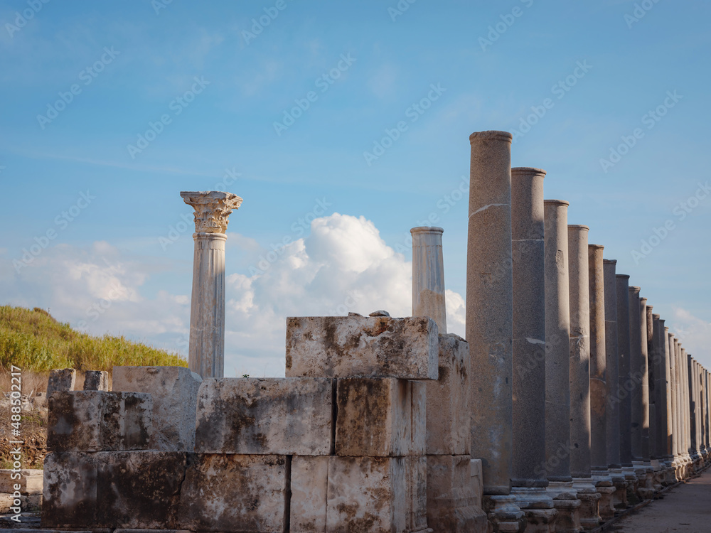 Agora columns with great sky viewin Perge or Perga ancient Greek city - once capital of Pamphylia in Antalya Turkey on warm October afternoon. Agora columns with great sky viewin Perge or Perga ancient Greek city - once capital of Pamphylia in Antalya Turkey on warm October afternoon.