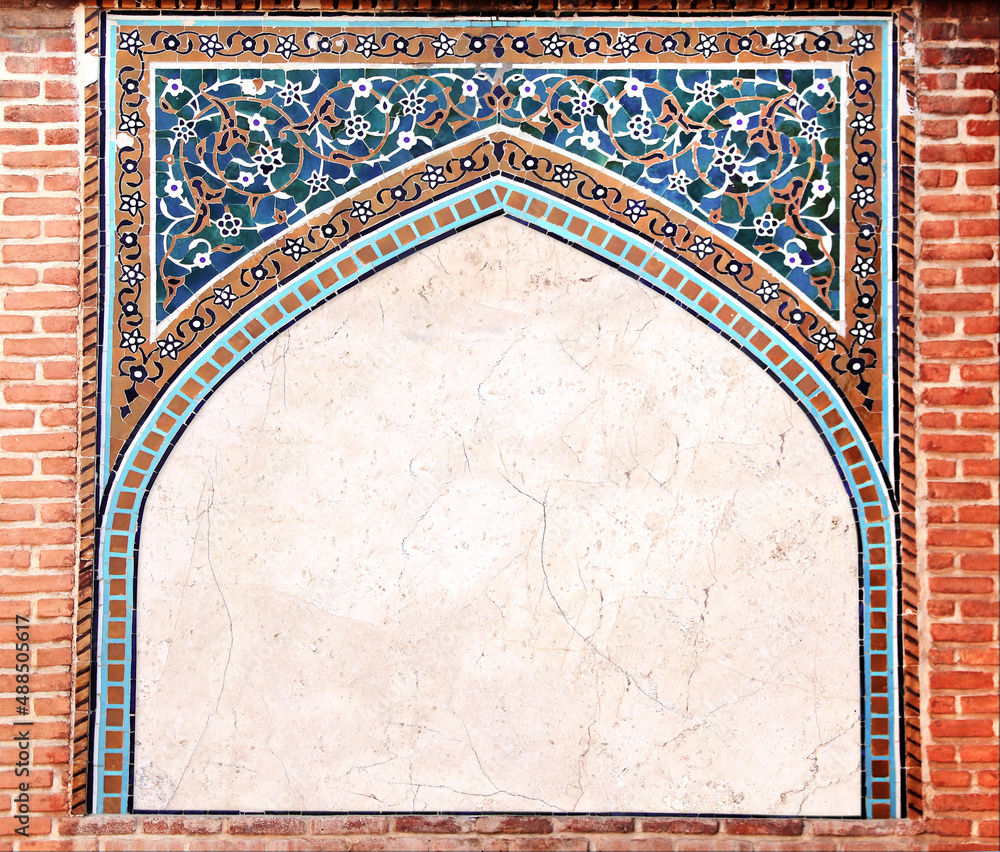 Detail of traditional persian mosaic wall with geometrical and floral ornament, Iran. Horizontal frame with ceramic tile