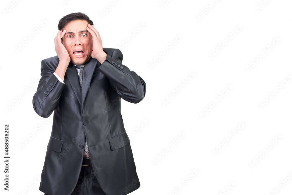 Scared man touching head and looking at camera Scared man touching head and looking at camera