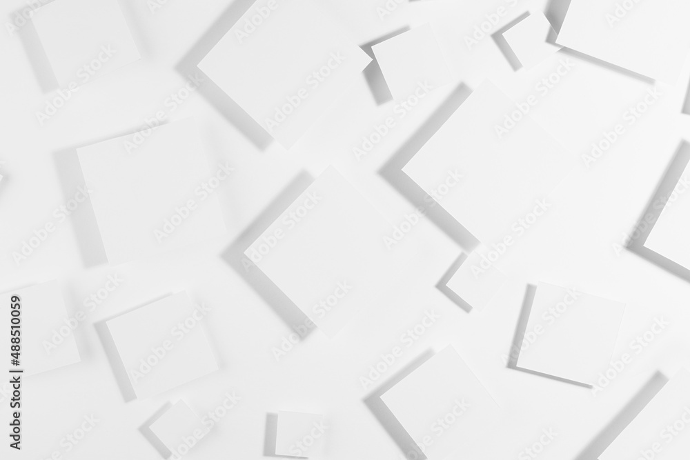 White geometric abstract background with rhombuses in hard light with soft shadows, top view, random pattern. Elegant modern backdrop in minimal style.