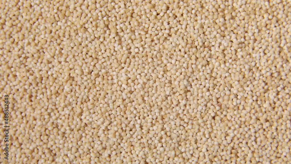 Rotation macro natural dried amaranth seeds, top view, close up texture background, Organic superfood, rich in nutrients, healthy food diet. Rotation macro natural dried amaranth seeds, top view, close up texture background, Organic superfood, rich in nutrients, healthy food diet.