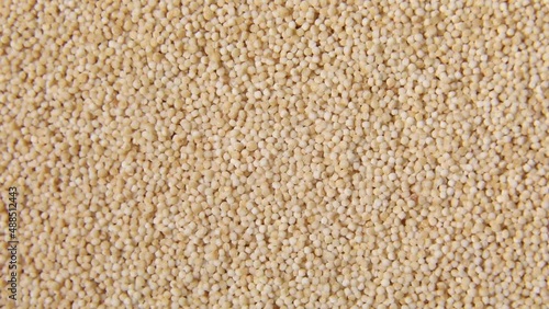 Rotation macro natural dried amaranth seeds, top view, close up texture background, Organic superfood, rich in nutrients, healthy food diet.