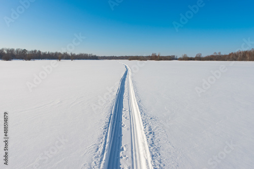 Wallpaper Mural Snowmobile road on a snowy field. Torontodigital.ca