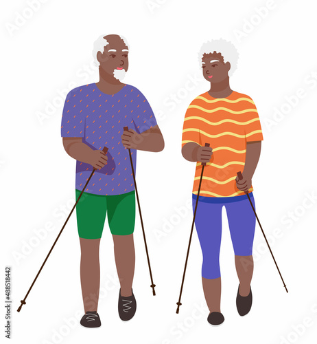 two elderly afro american people with gray hair are engaged in Norwegian or Scandinavian walking. 