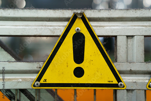 Old industrial safety sign. Warning safety sign inside a factory