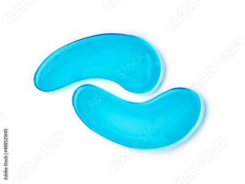 Photographie Blue collagen hydrogel eye patches isolated on white background