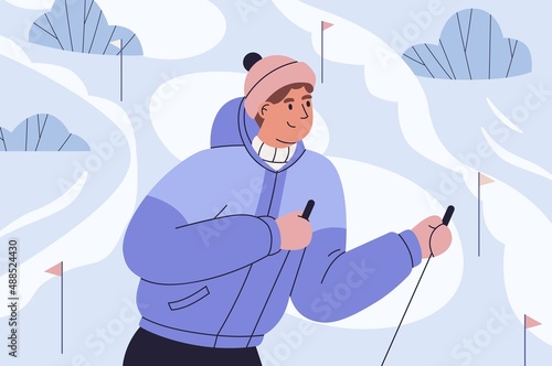 Skier in mountains, ski resort. Happy active man with poles in hands during w...