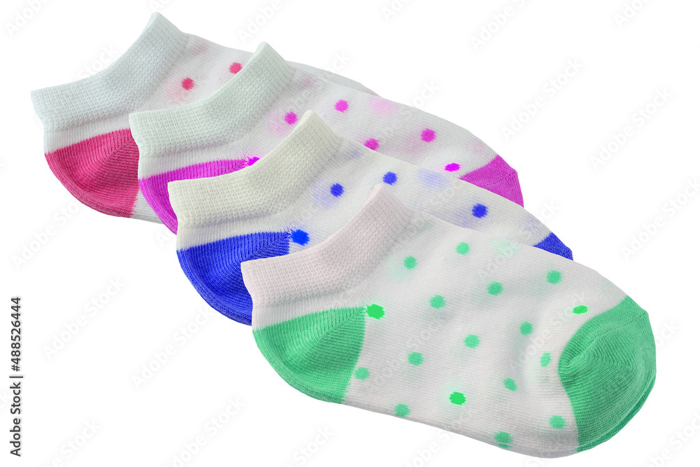 Colorful set of four baby socks isolated on a white background. Baby fashion.