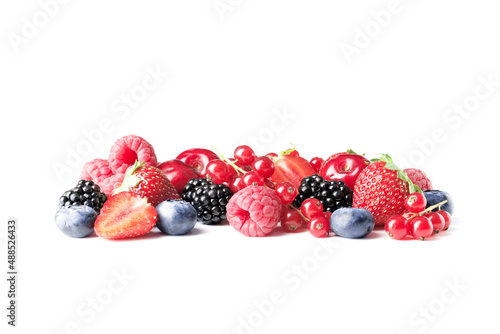 Different ripe tasty berries on white background such as strawberries  cherries  raspberries  blueberries  currants  blueberries.