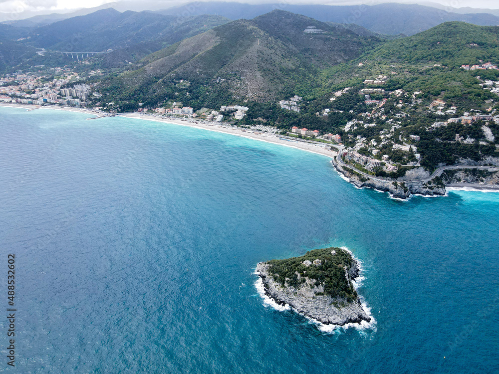 Aerial view of Bergeggi island, heart island from above, in Liguria, north Italy. Drone photography of the Ligurian coast, province of Savona with Spotorno and the island of Bergeggi.