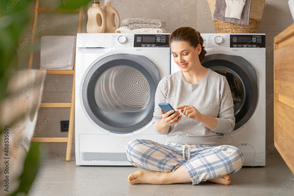 woman is doing laundry woman is doing laundry