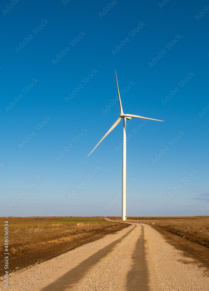 windmills in the field during the day, environmentally friendly and safe production of electricity
