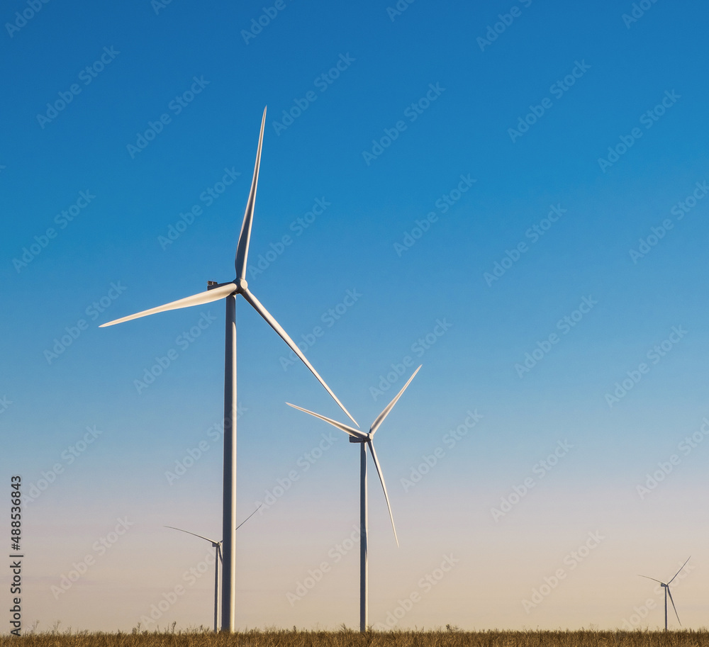 windmills in the field during the day, environmentally friendly and safe production of electricity