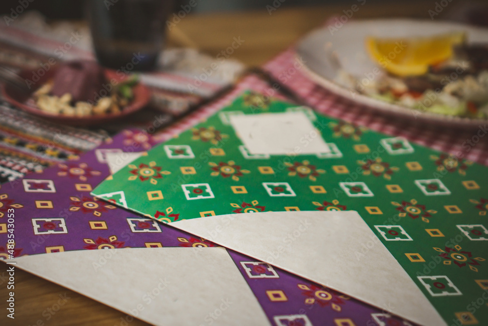 Naklejka premium Menu on a table set in a restaurant