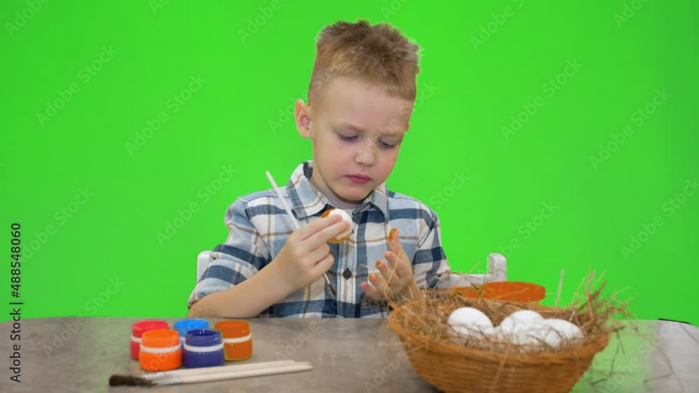 5 year old boy painting Easter eggs, chromakey 5 year old boy painting Easter eggs, chromakey