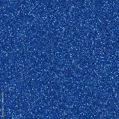 Dark blue shiny glitter, sparkle confetti texture. Christmas abstract background, seamless pattern.
