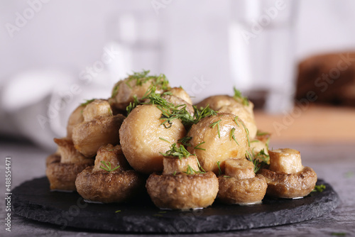 mushrooms and champignons baked in the oven with butter