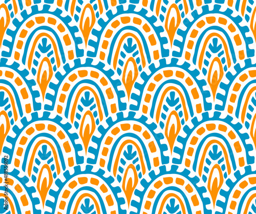 Seamless wavy pattern. Ethnic and tribal motifs. Seigaiha print in doodle style. Grunge texture.  Blue, yellow, orange and white ornament for your textiles. Vector illustration.