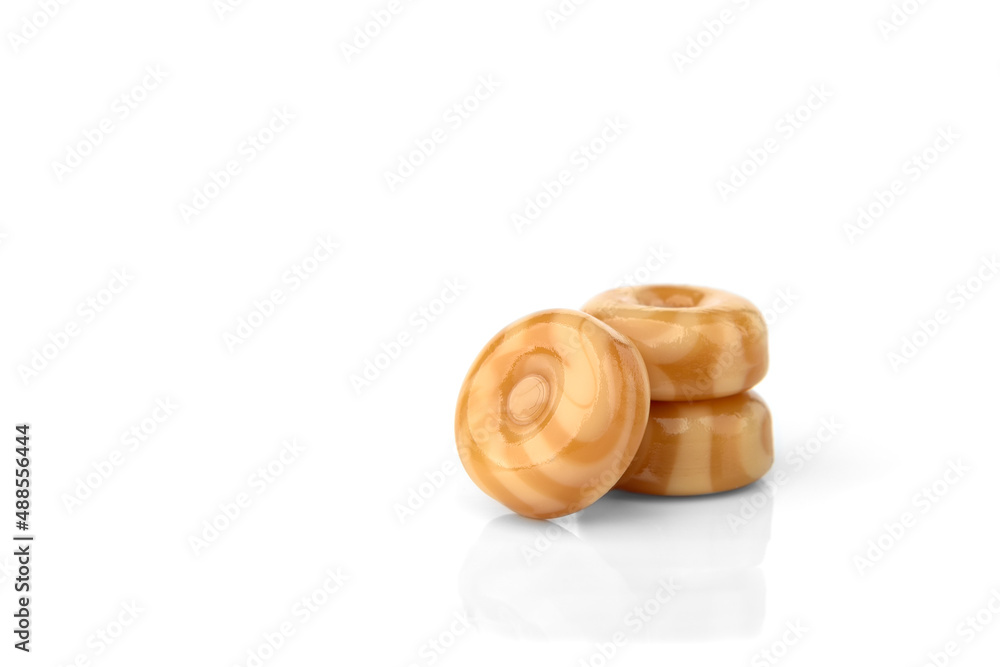 Milk candy lollipop isolated on white background. Milk candy lollipop isolated on white background.