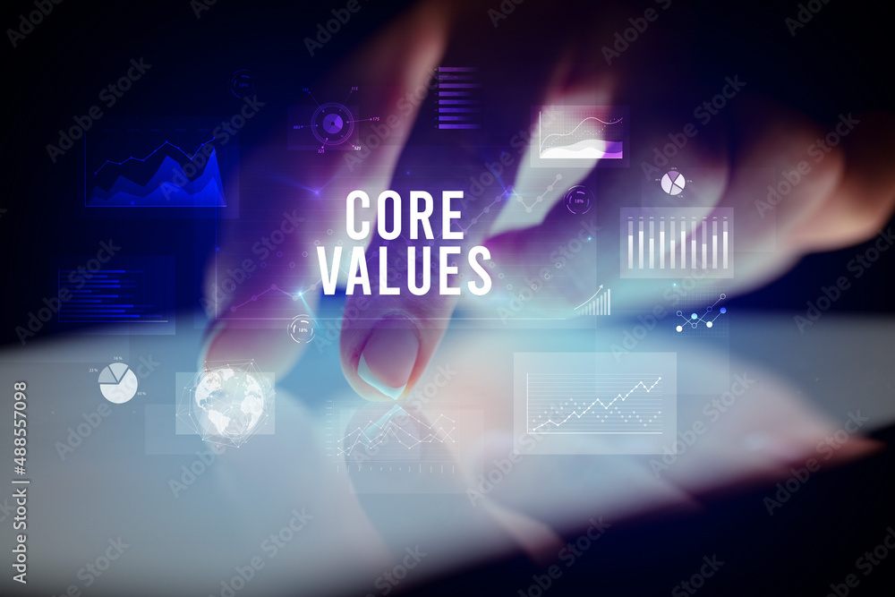 Finger touching tablet with business graphs and icons concept Finger touching tablet with business graphs and icons concept