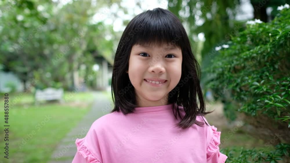 portrait asian kid, child enjoy and happy, the girl is smiling
portrait asian kid, child enjoy and happy, the girl is smiling