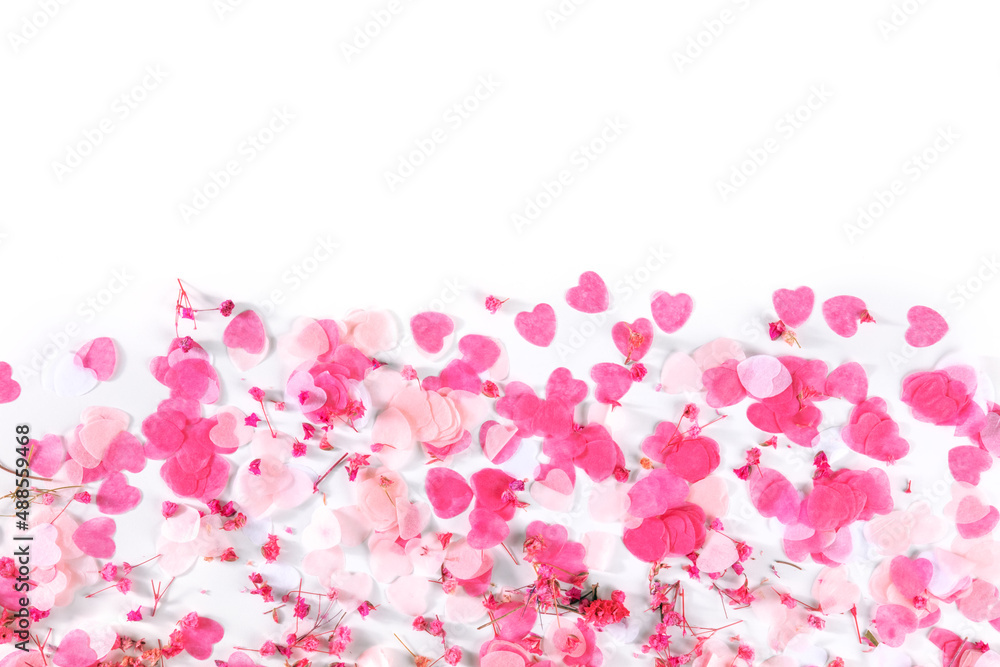 Valentine day or wedding romantic background with pink hearts on white with a place for text, a design for a greeting card or invitation