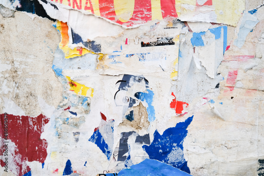 Fototapeta premium Ripped street poster background. Torn paper, abstract texture.