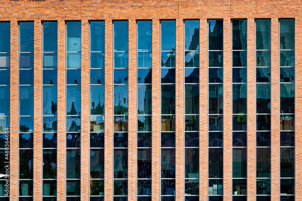 windows of a building , image taken in stettin szczecin west poland, europe - obrazy, fototapety, plakaty 