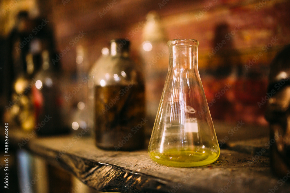 Antique medical bottle. Dark mystery halloween concept