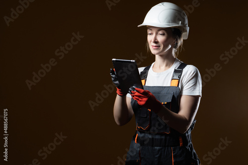 Woman engineer. Builder wit...