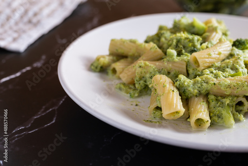 Creamy macaroni pasta with cheese and broccoli. Quick and easy vegetarian recipe.