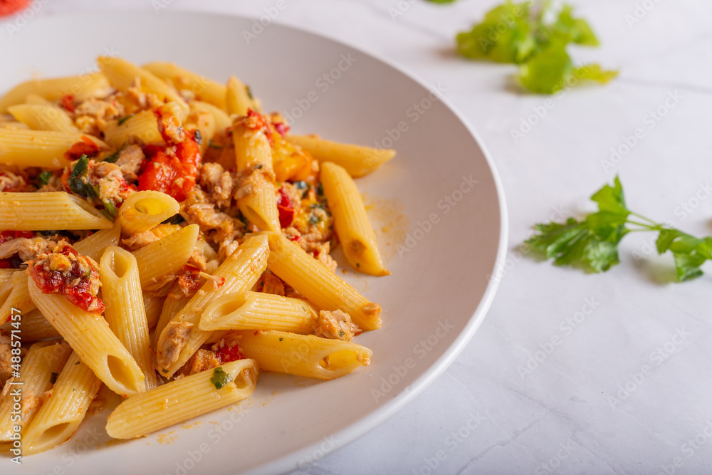 Penne with tuna and peppers. Easy and quick recipe typical of Mediterranean cuisine Penne with tuna and peppers. Easy and quick recipe typical of Mediterranean cuisine