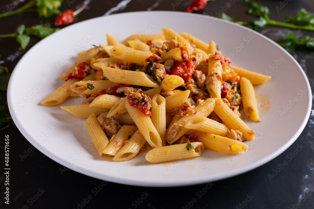 Penne with tuna and peppers. Easy and quick recipe typical of Mediterranean cuisine